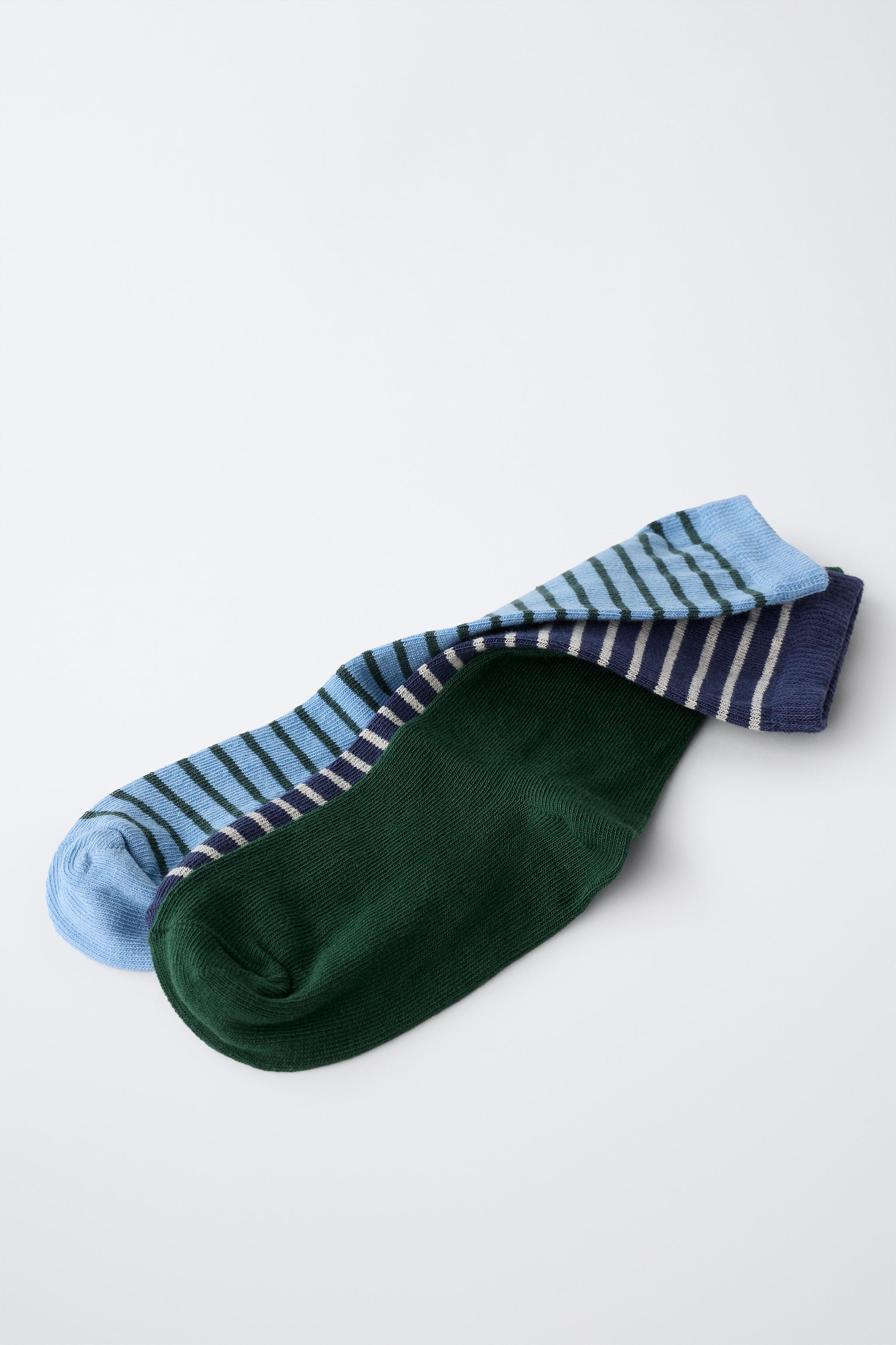 STRIPED AND SOLID MID-CALF SOCKS THREE-PACK